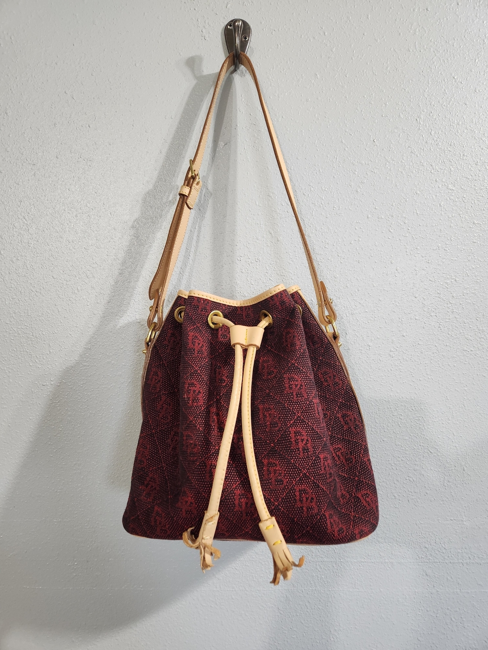 Dooney & Bourke Burgundy Monogram Drawstring Hobo with Tan Trim Bucket Bag
